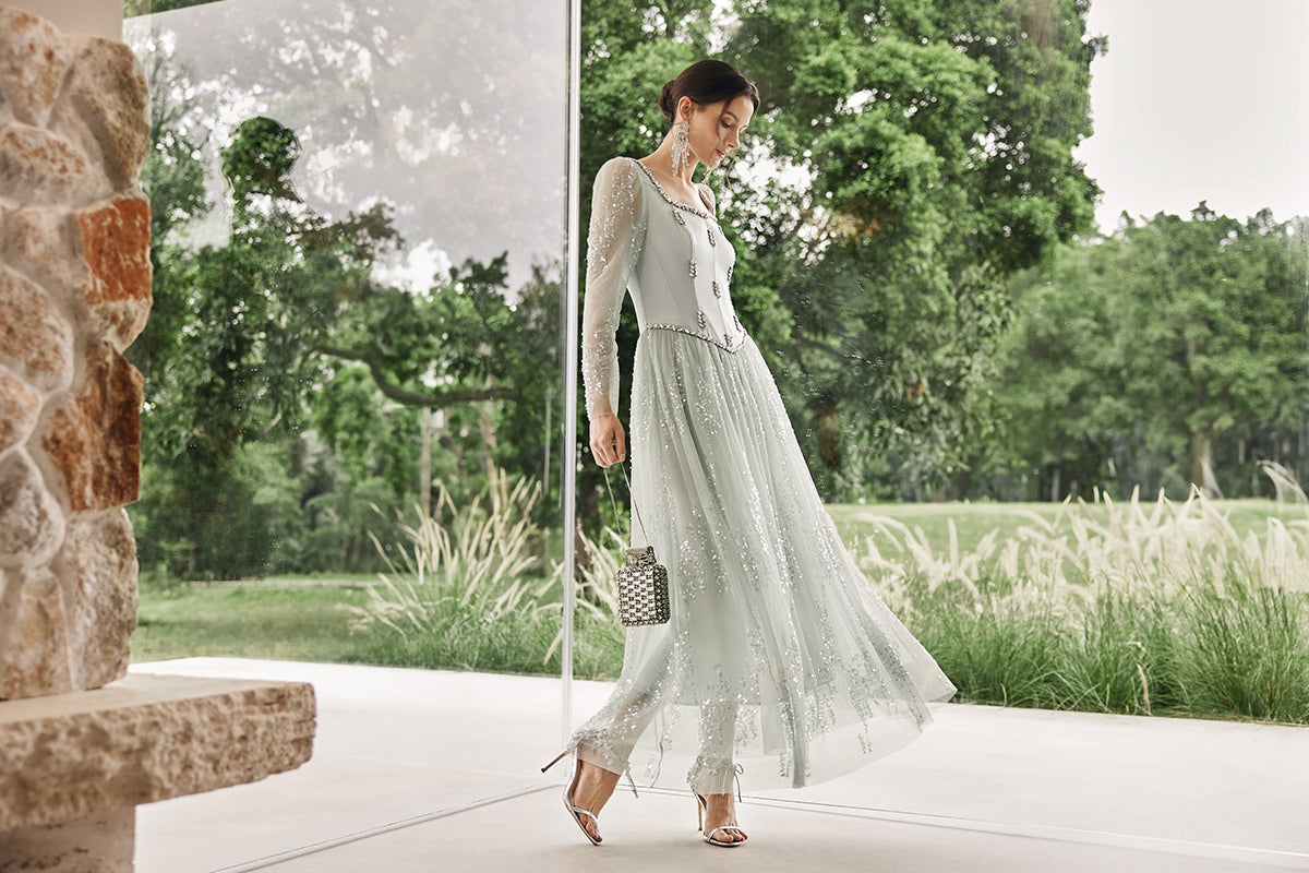 Richradiqs embroidered tulle dress in an elegant garden setting
