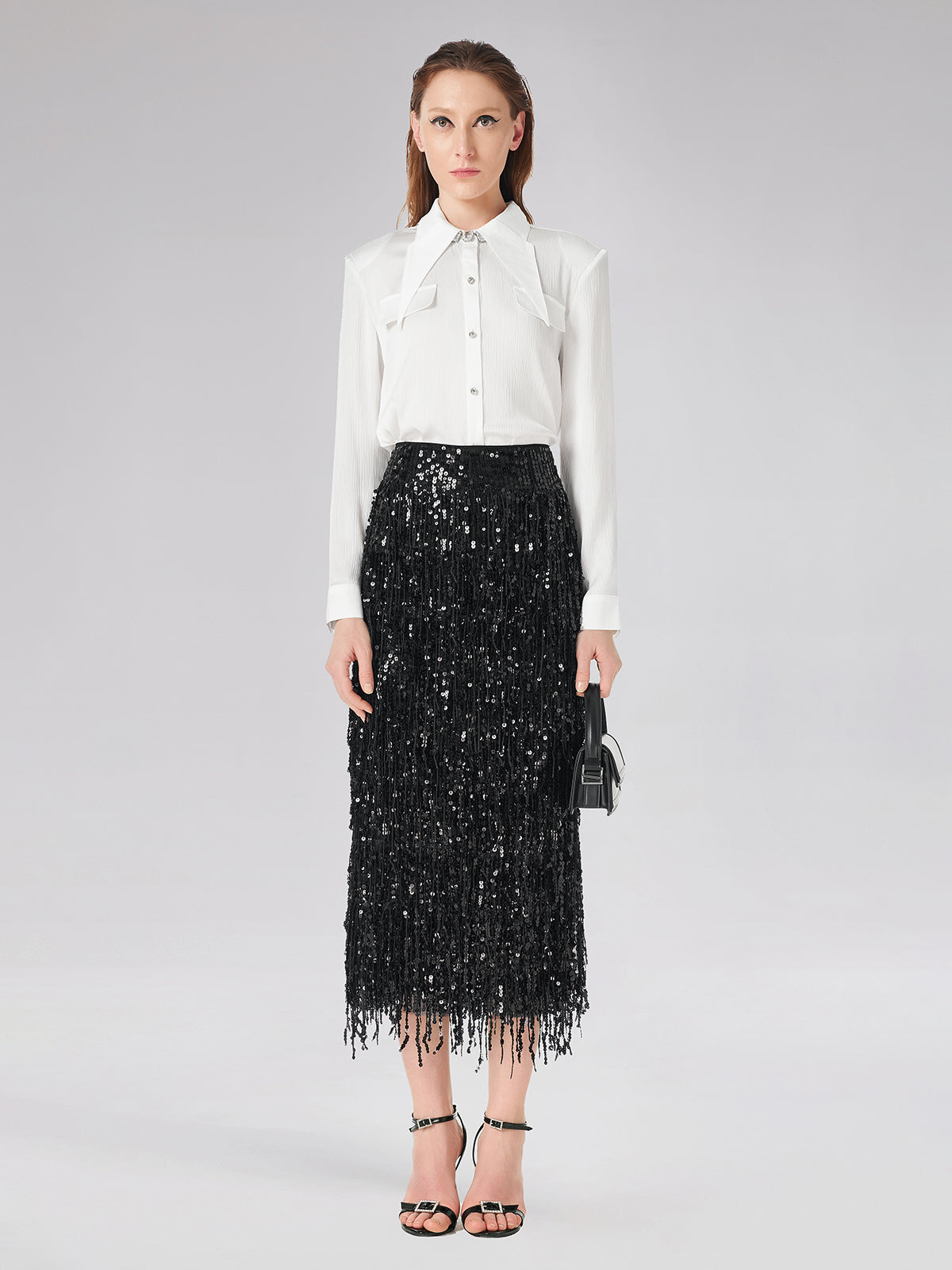 Styled outfit with modern silhouette and clean presentation