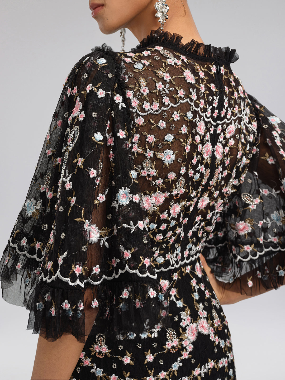 Black sheer floral embroidered dress with ruffle sleeves and delicate details