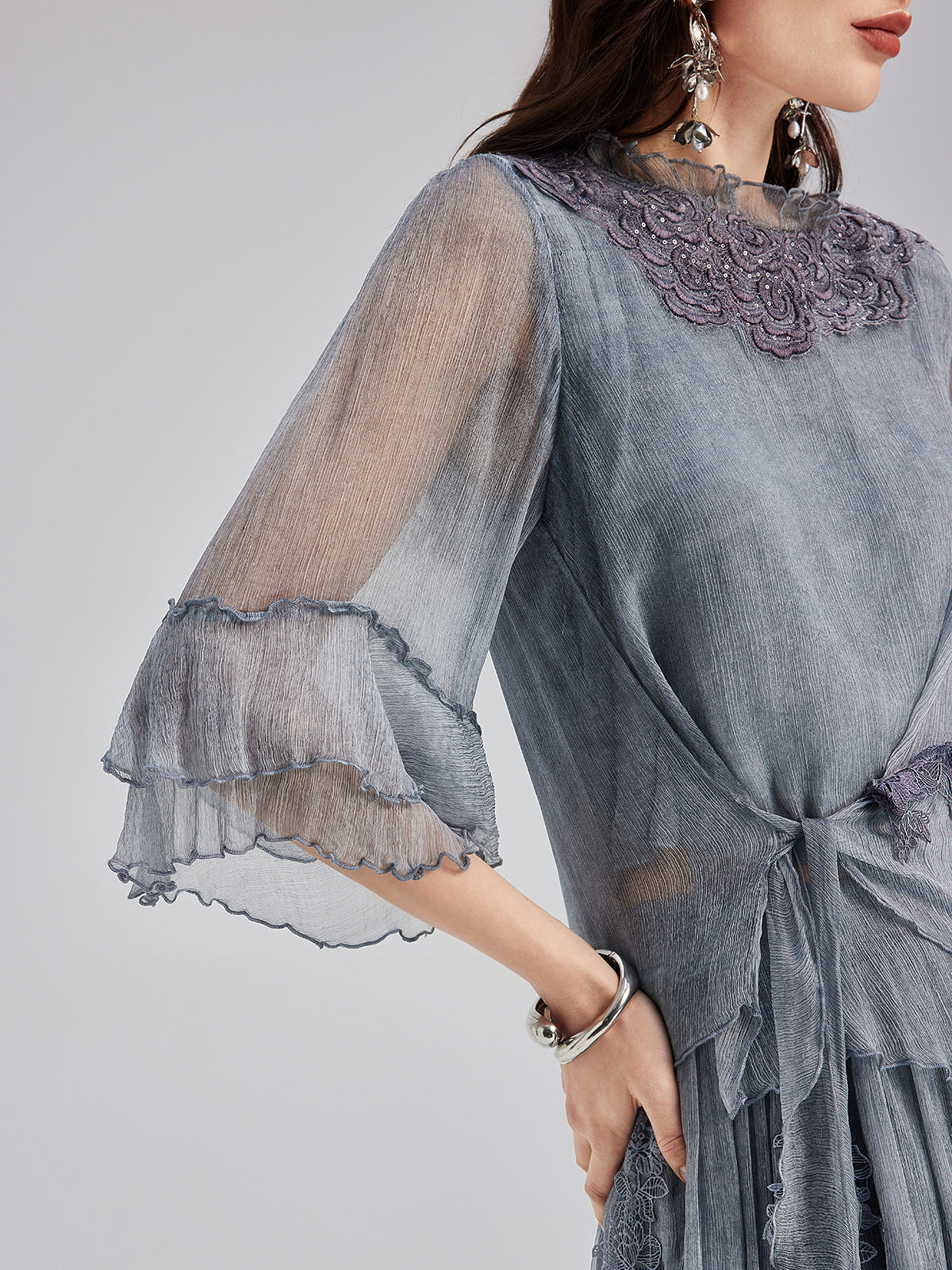 Structured garment with modern proportions and smooth fabric