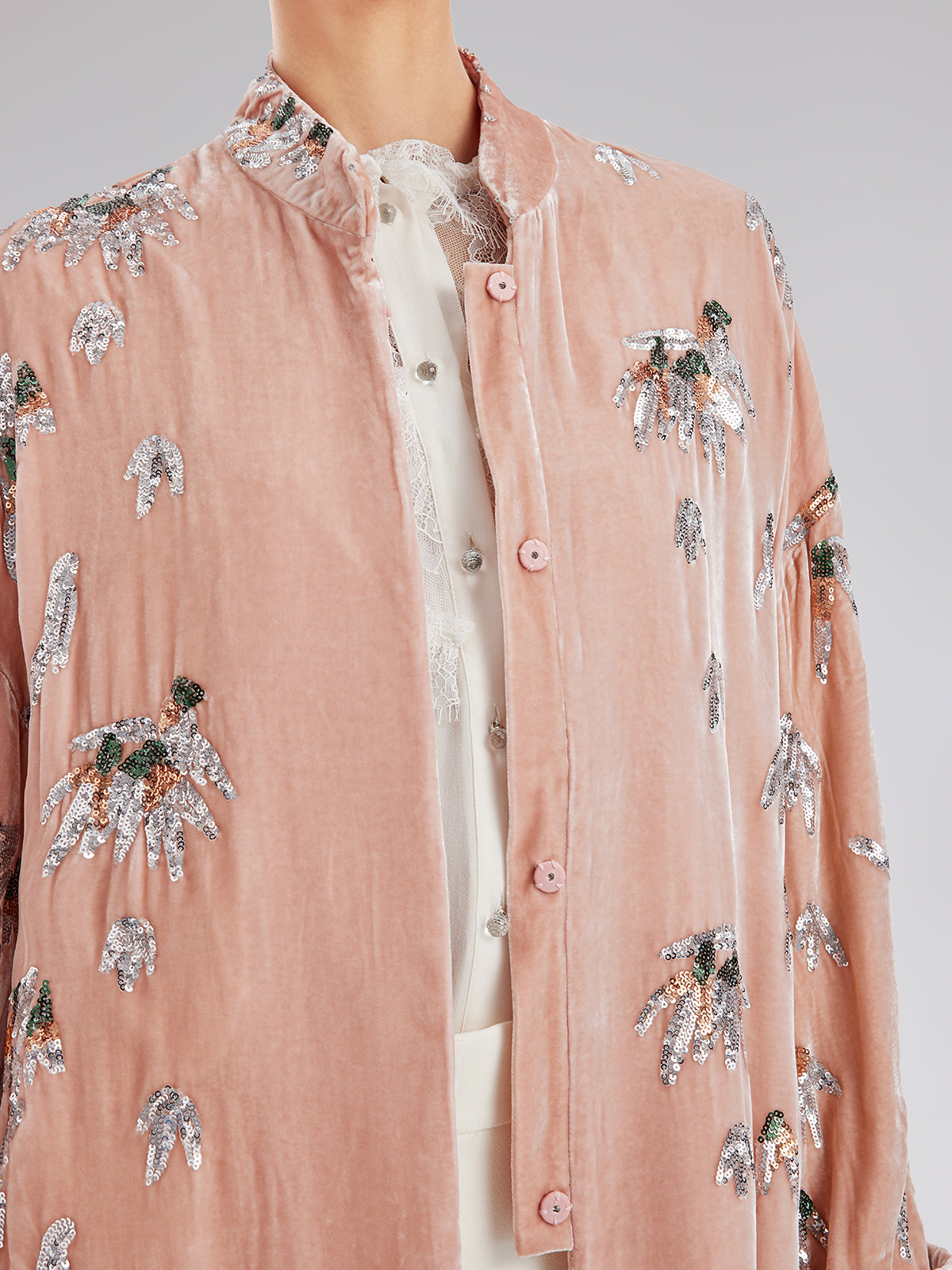Blush pink velvet jacket featuring silver sequin floral embroidery and button-front detailing