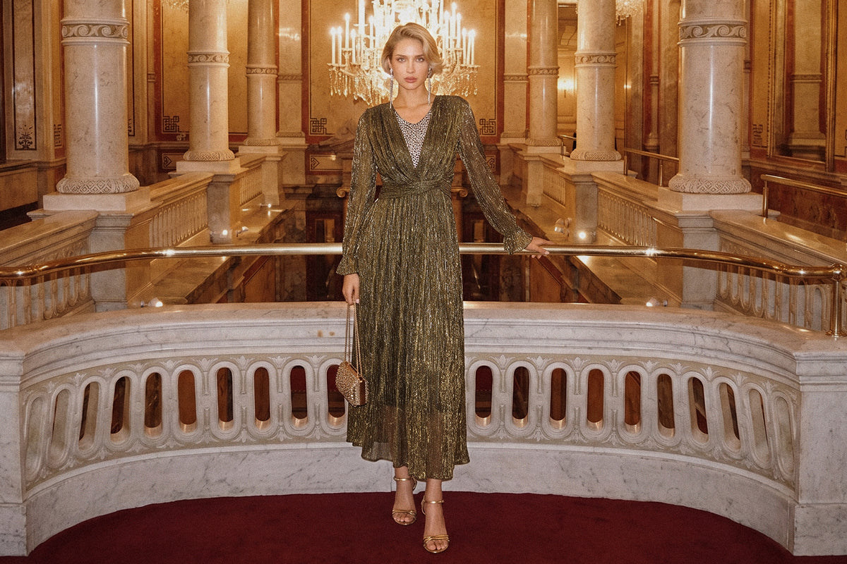 Woman in a gold crystal embellished gown