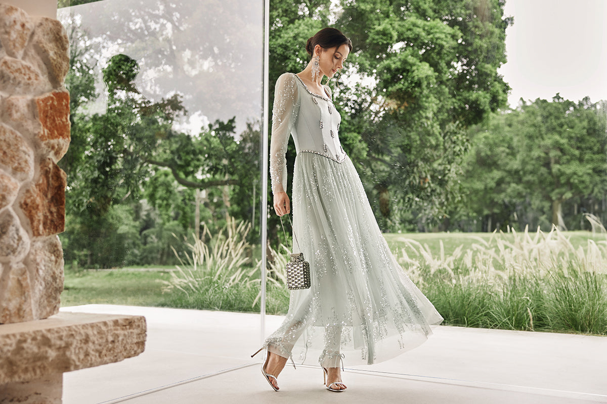 Richradiqs embroidered tulle dress in an elegant garden setting