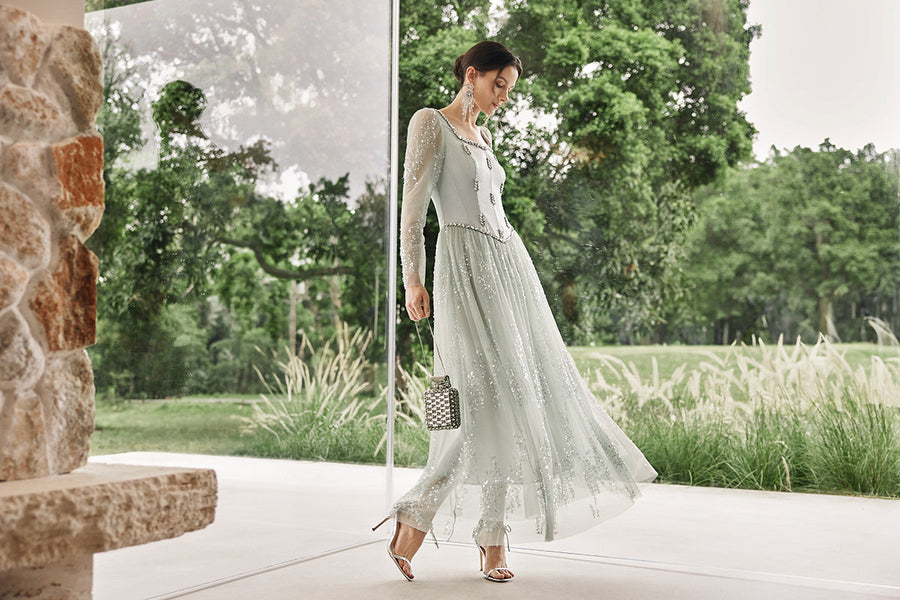 Richradiqs embroidered tulle dress in an elegant garden setting