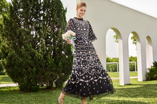 richradiqs black floral embroidered maxi dress for a formal garden engagement shoot