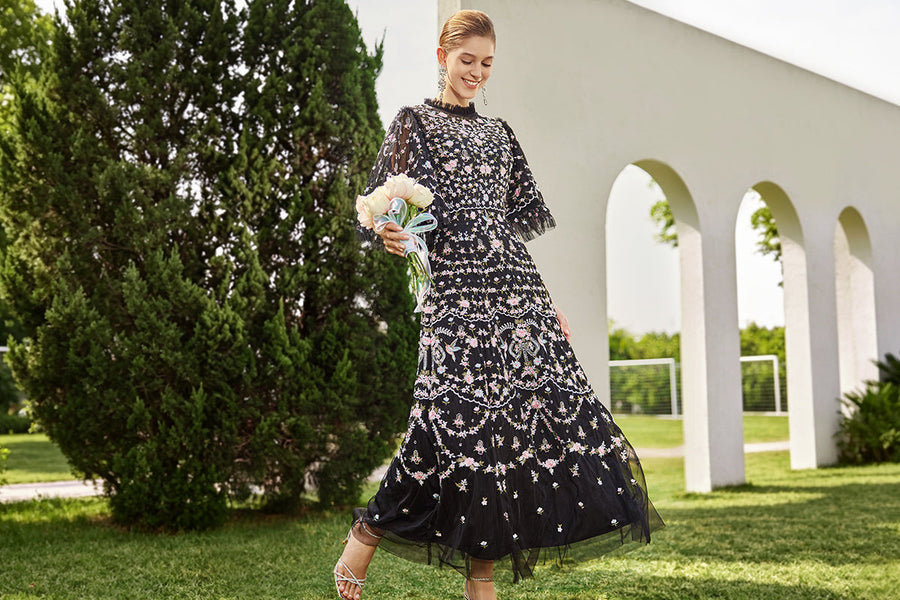 richradiqs black floral embroidered maxi dress for a formal garden engagement shoot