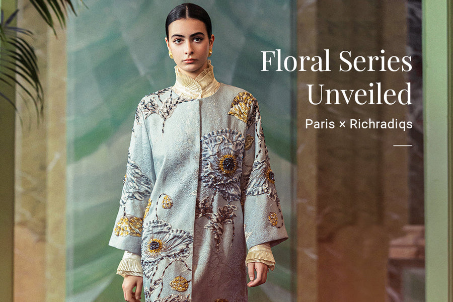 Elegant floral embroidered coat with artistic design and textured fabric, perfect for fashion events or statement styling, more refined than typical outerwear