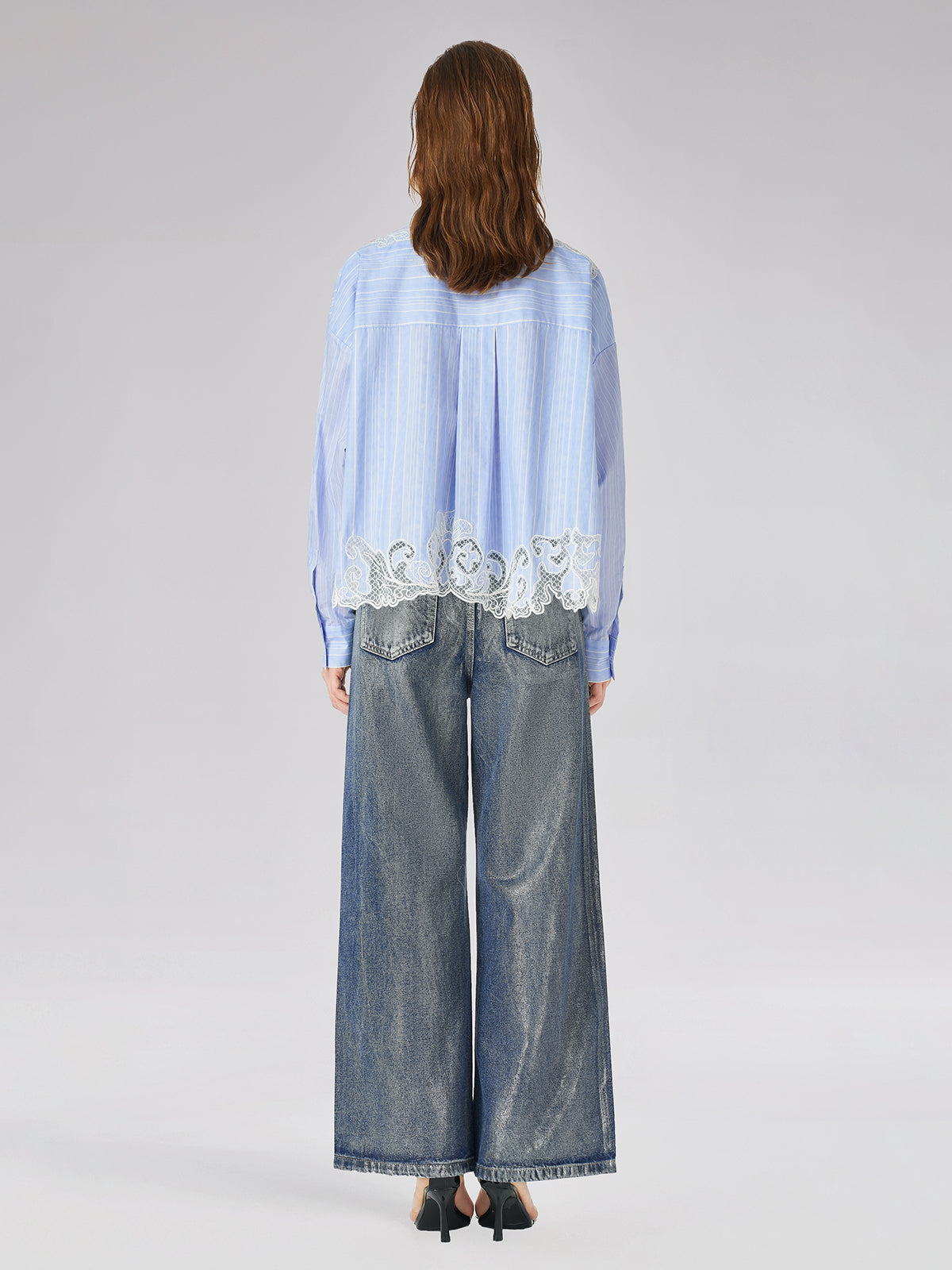 Styled outfit with modern proportions and natural composition