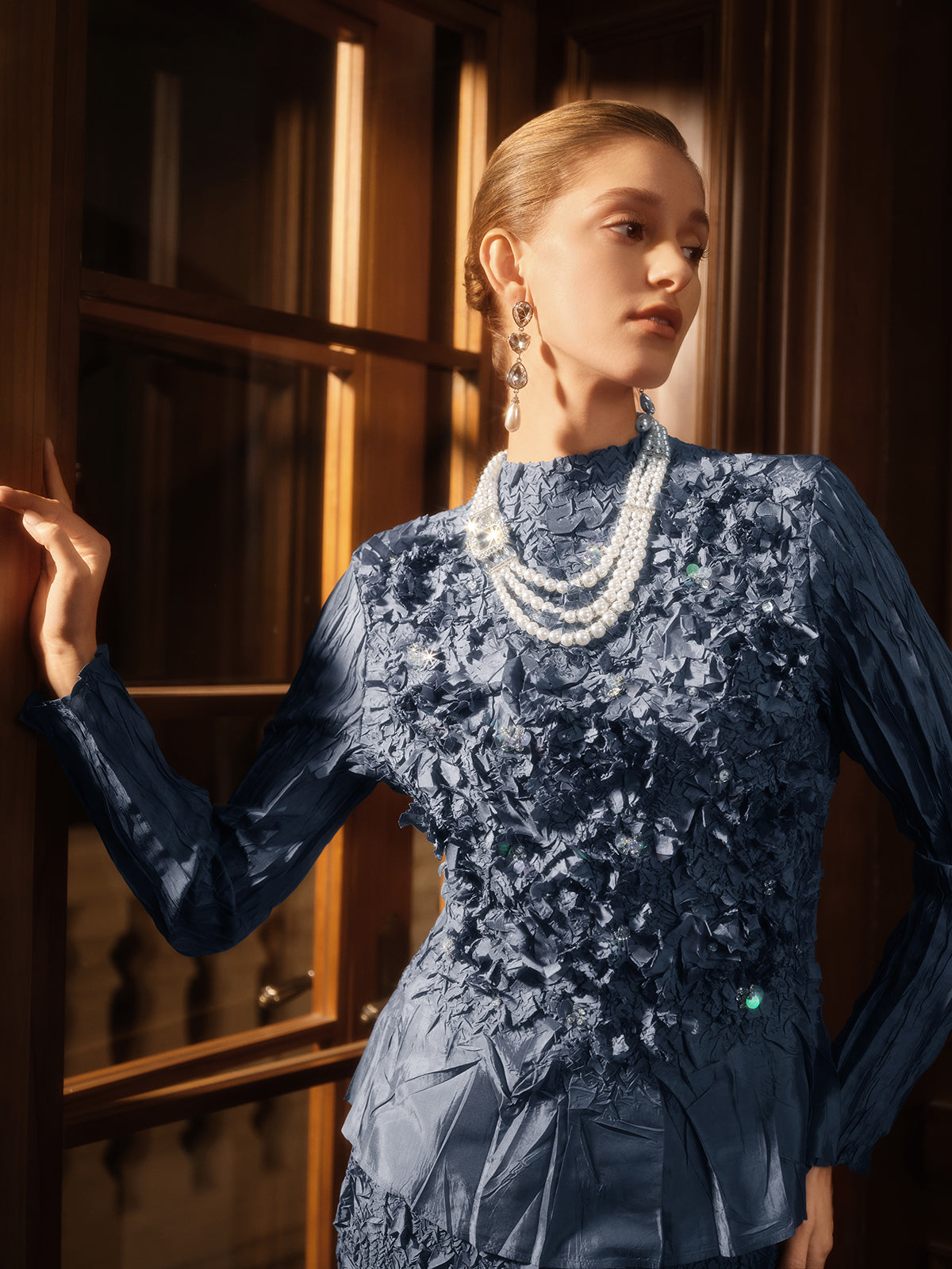 Modern clothing piece with clean lines and refined structure
