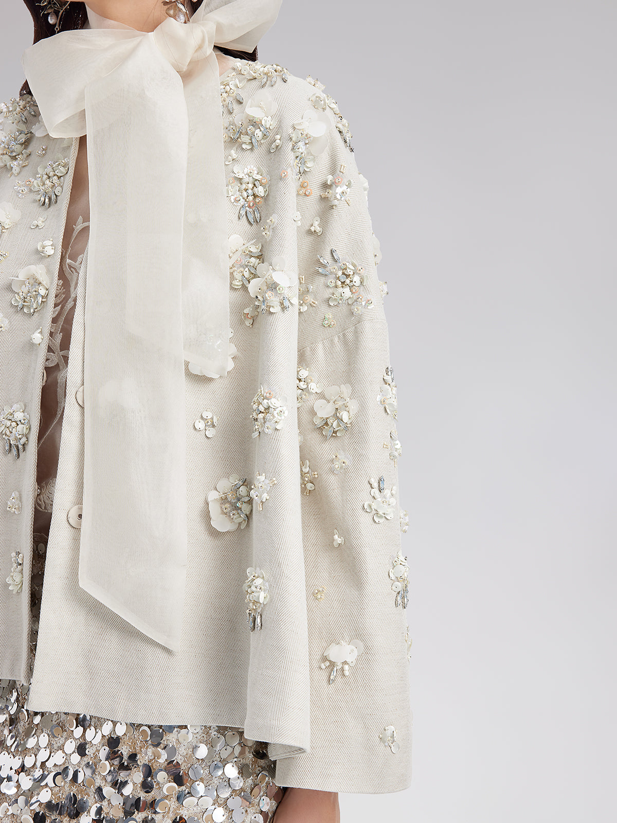 Contemporary clothing piece with smooth finish and refined cut