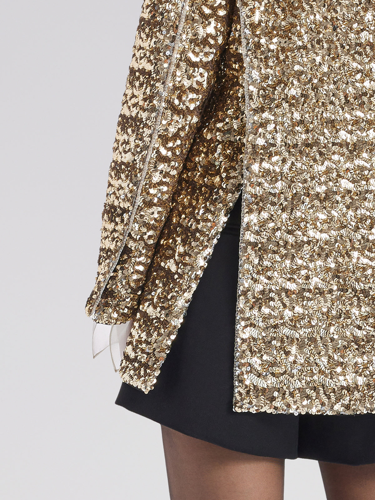 Contemporary garment with structured silhouette and smooth finish
